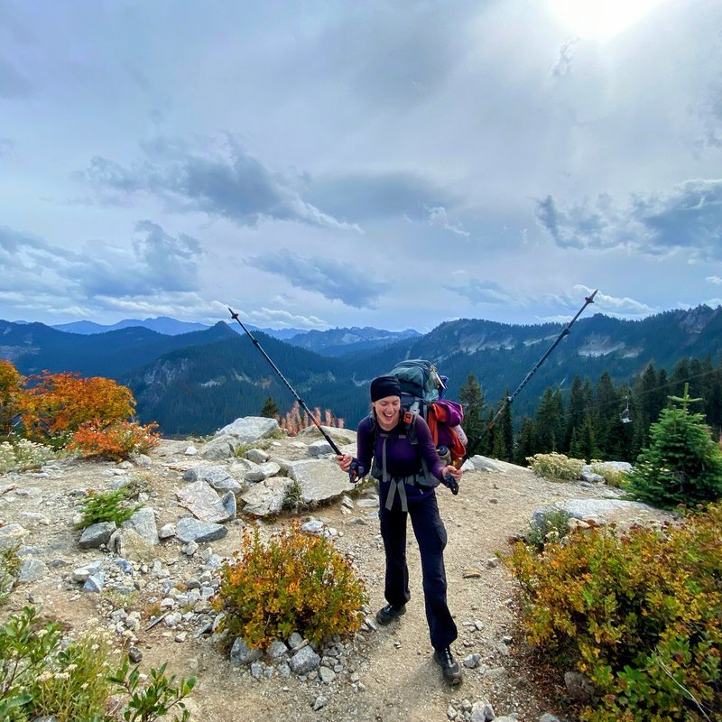 Student on a trail atop a mountain