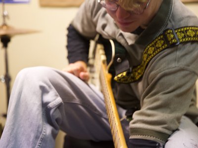 Eric plays his guitar