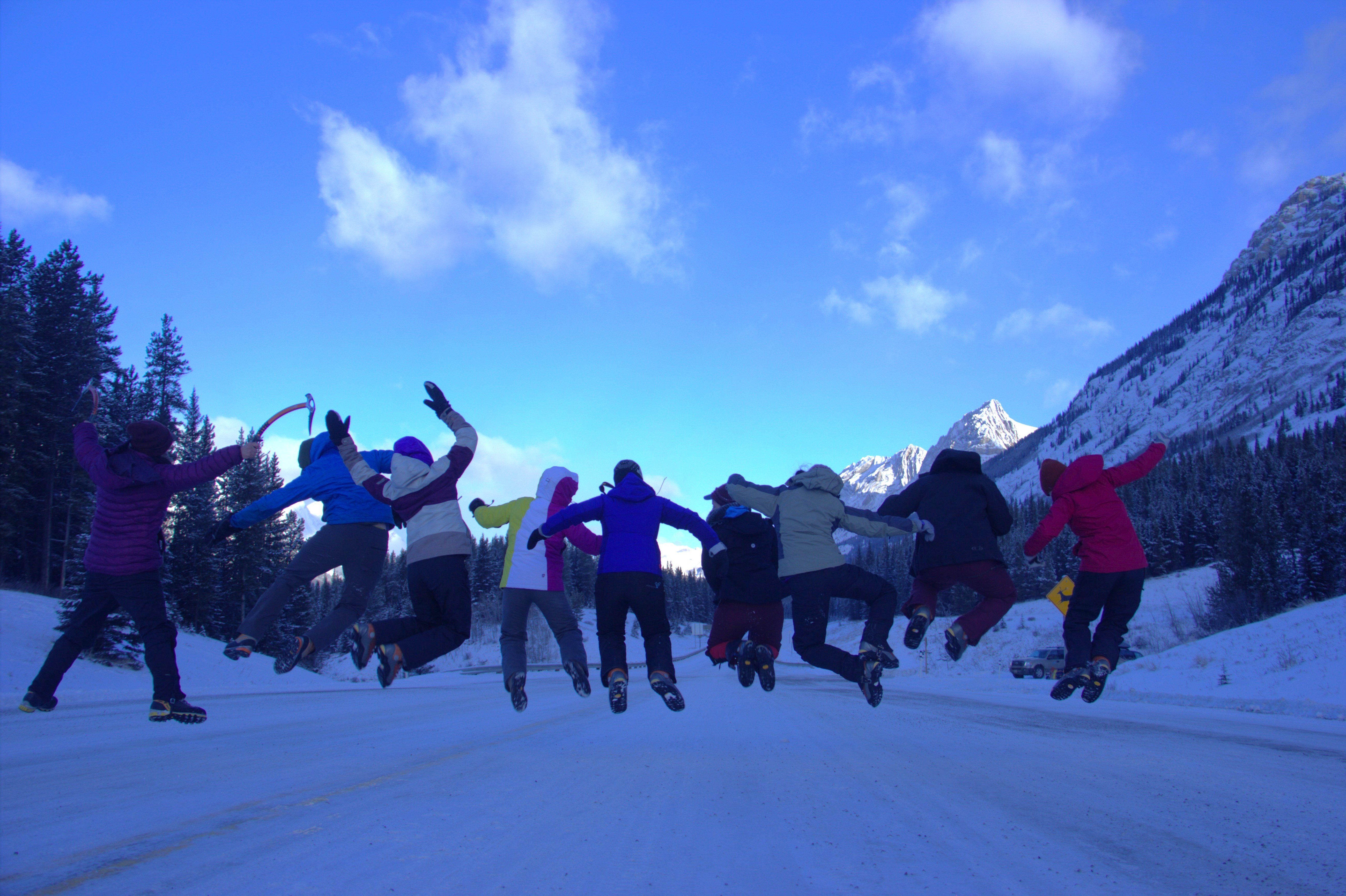 Jumping for joy on a snowy mountain