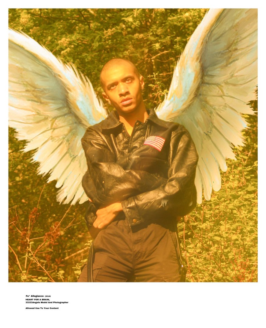 digitally edited photograph of Brandon Santana with angel's wings, wearing a leather jacket and posing in front of trees