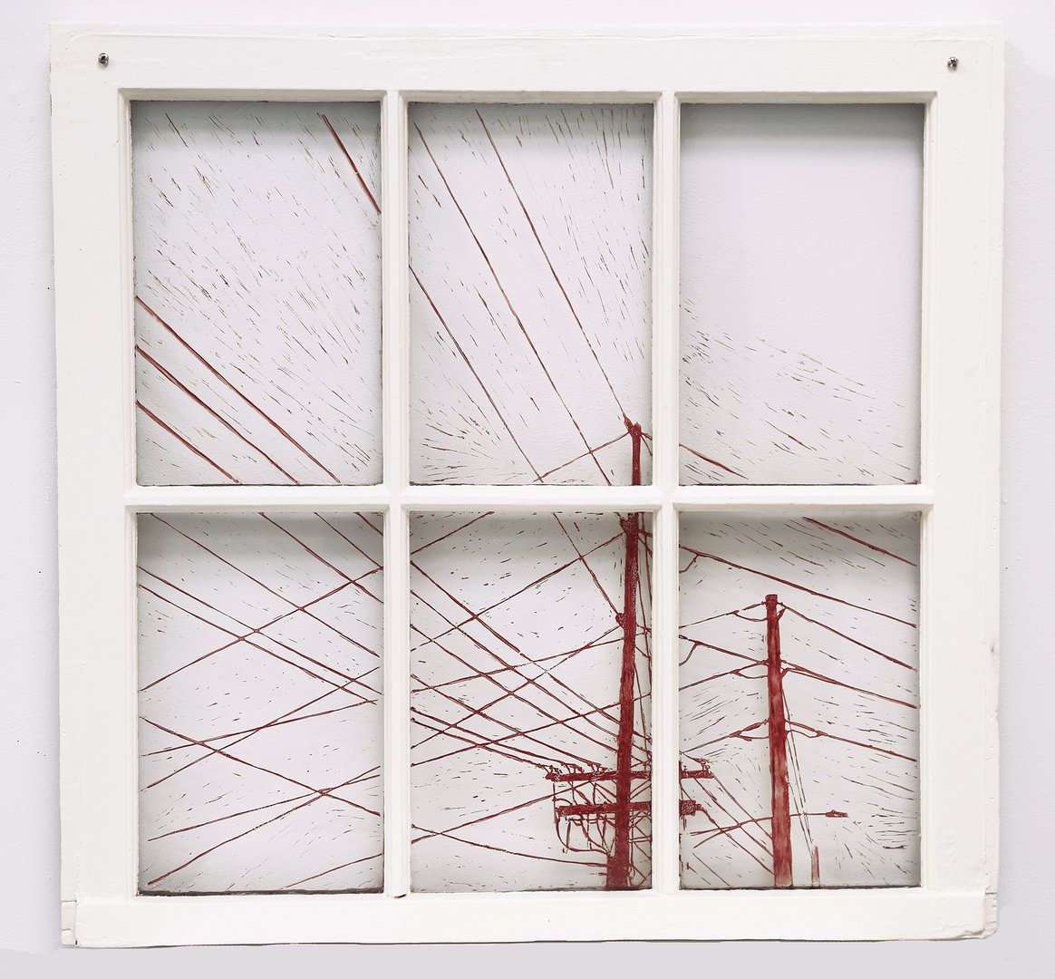Relief print of electricity lines on glass window in white and red wide.jpg