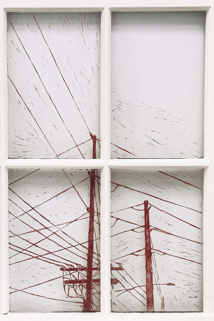 Relief print of electricity lines on glass window in white and red tall.jpg